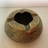 Individual ashtray in worked brass