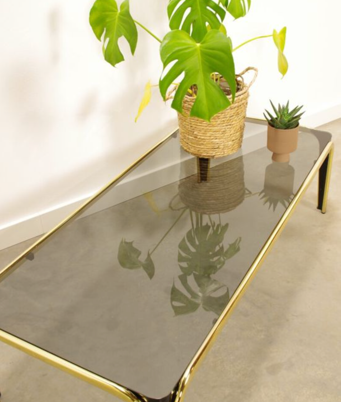 Vintage coffee table in brass and smoked glass