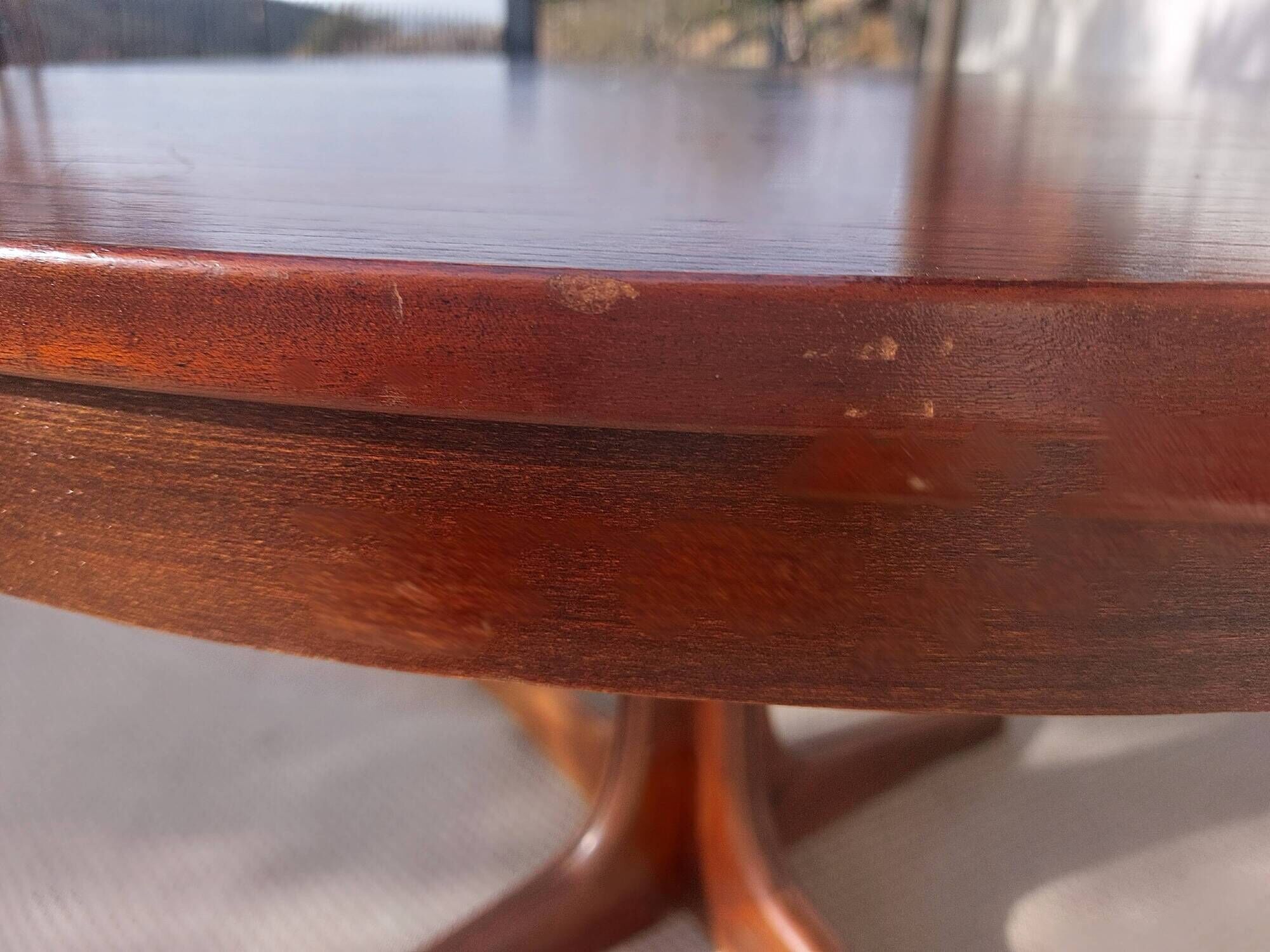 round/oval table with extension, central leg, dark shade, Baumann design