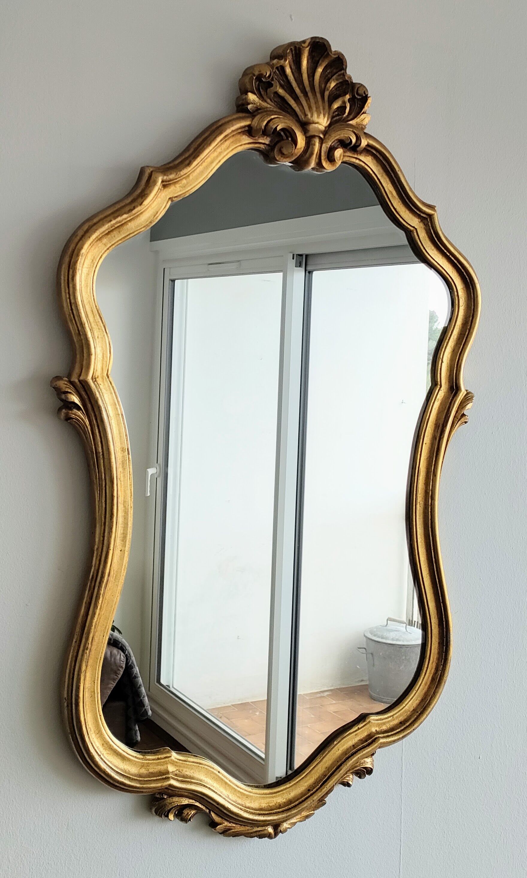 Large gilded mirror shell Louis XV style