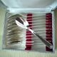Set of 12 silver-plated coffee spoons in "shell" design.