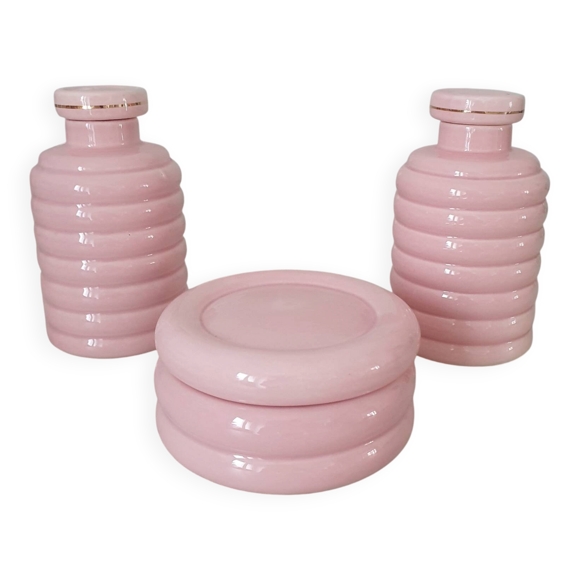 Set of pink and gold ceramic bathroom accessories