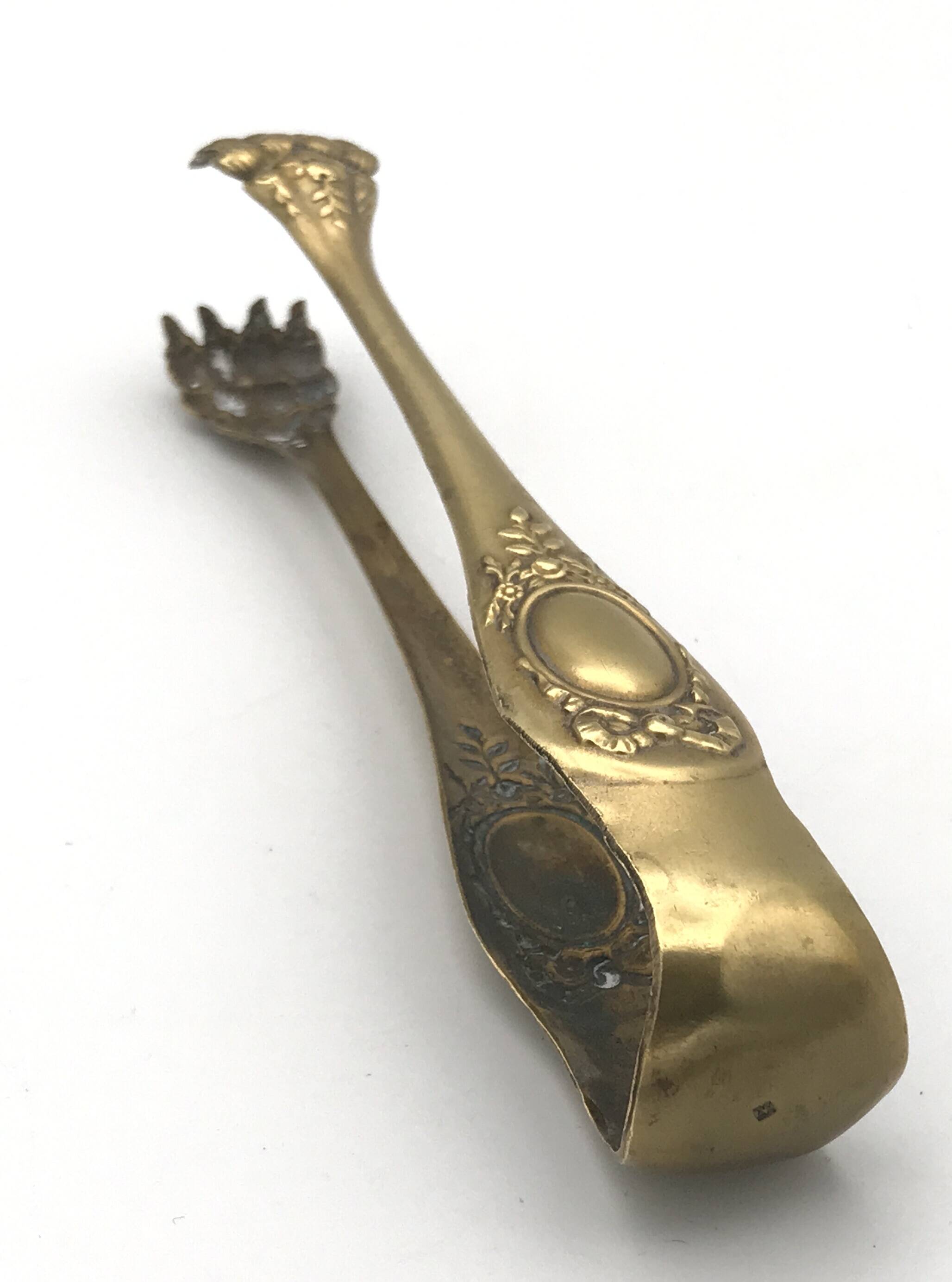 Sugar or ice cube tongs, gold star stamp with lion paw finish