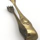 Sugar or ice cube tongs, gold star stamp with lion paw finish