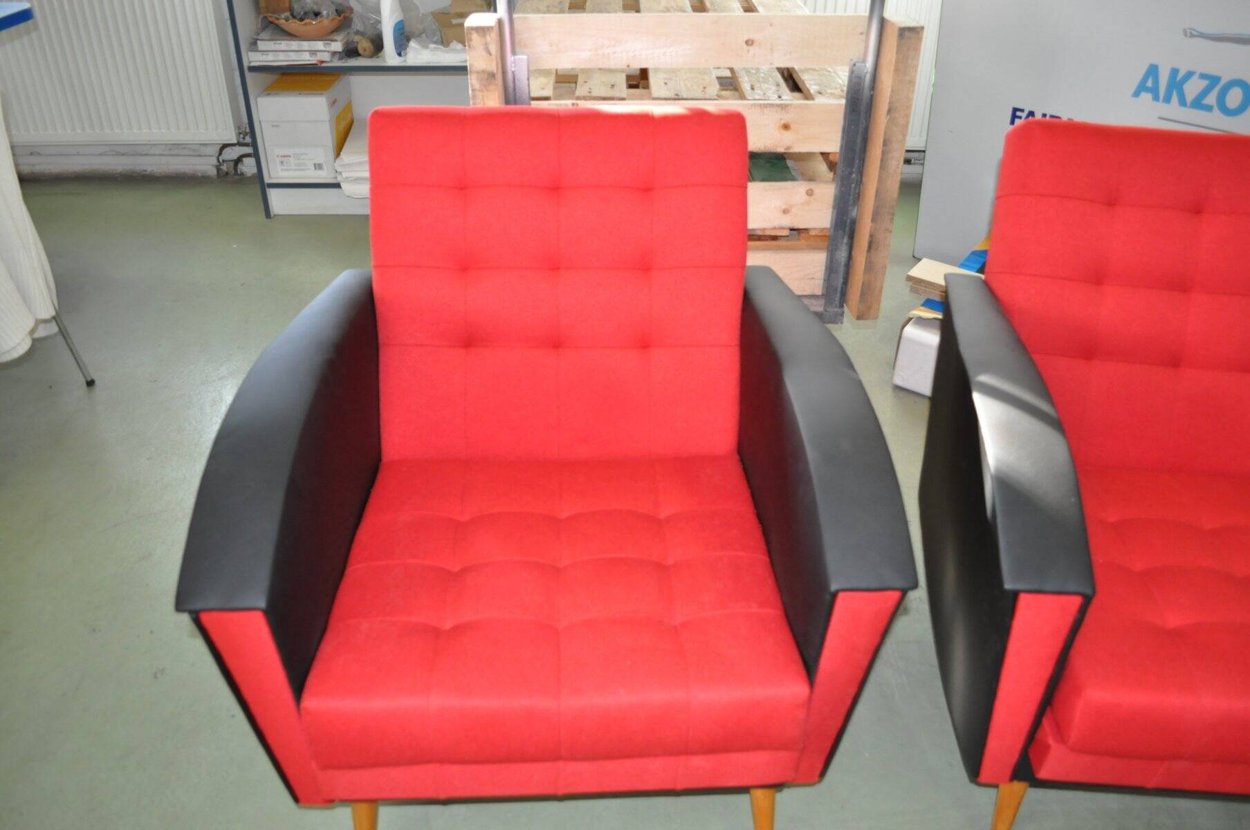 Pair of vintage red fabric armchairs with light wood legs from the 1960s.