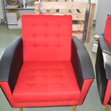 Pair of vintage red fabric armchairs with light wood legs from the 1960s.