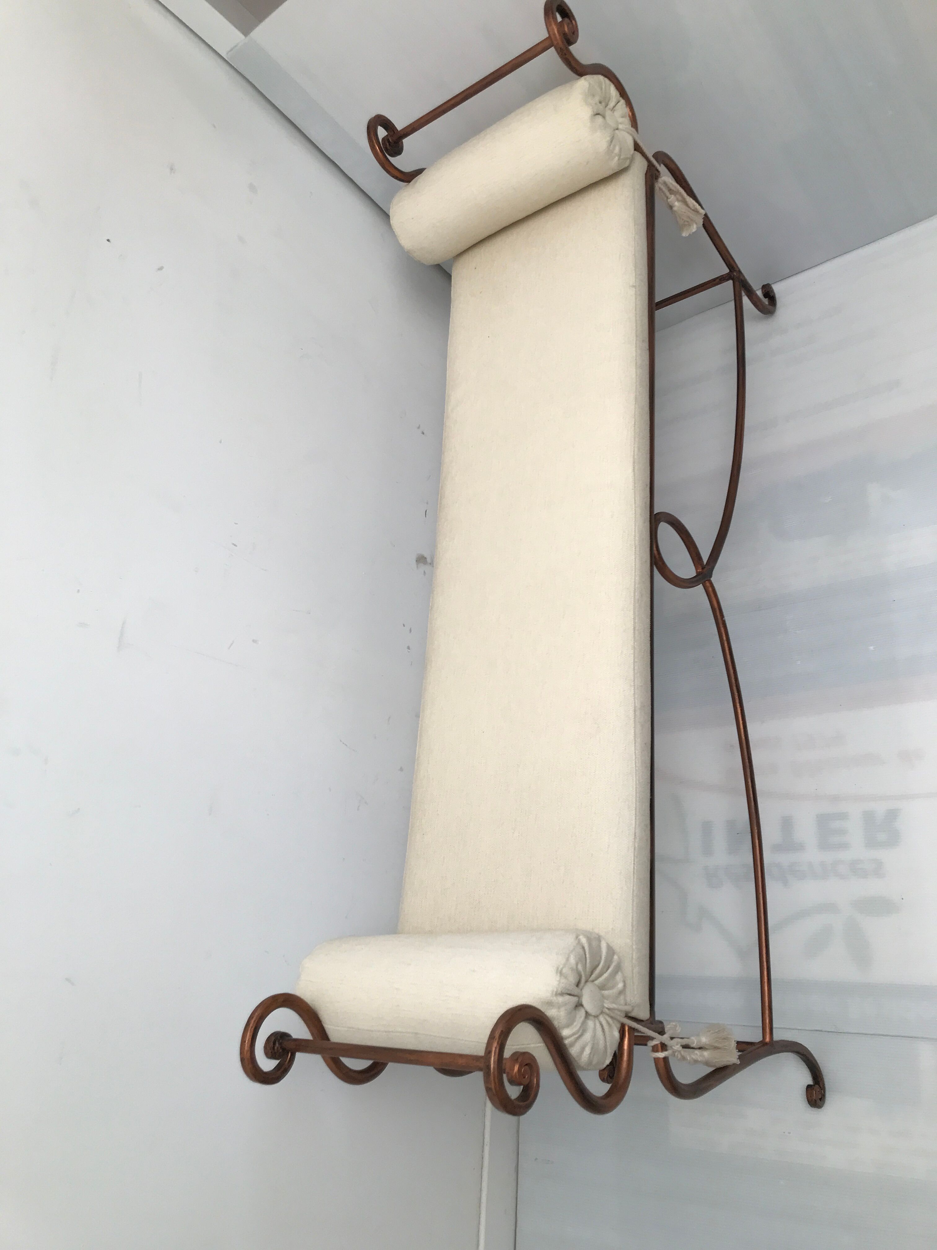 Copper wrought iron bench with cushions