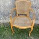 Cane armchair