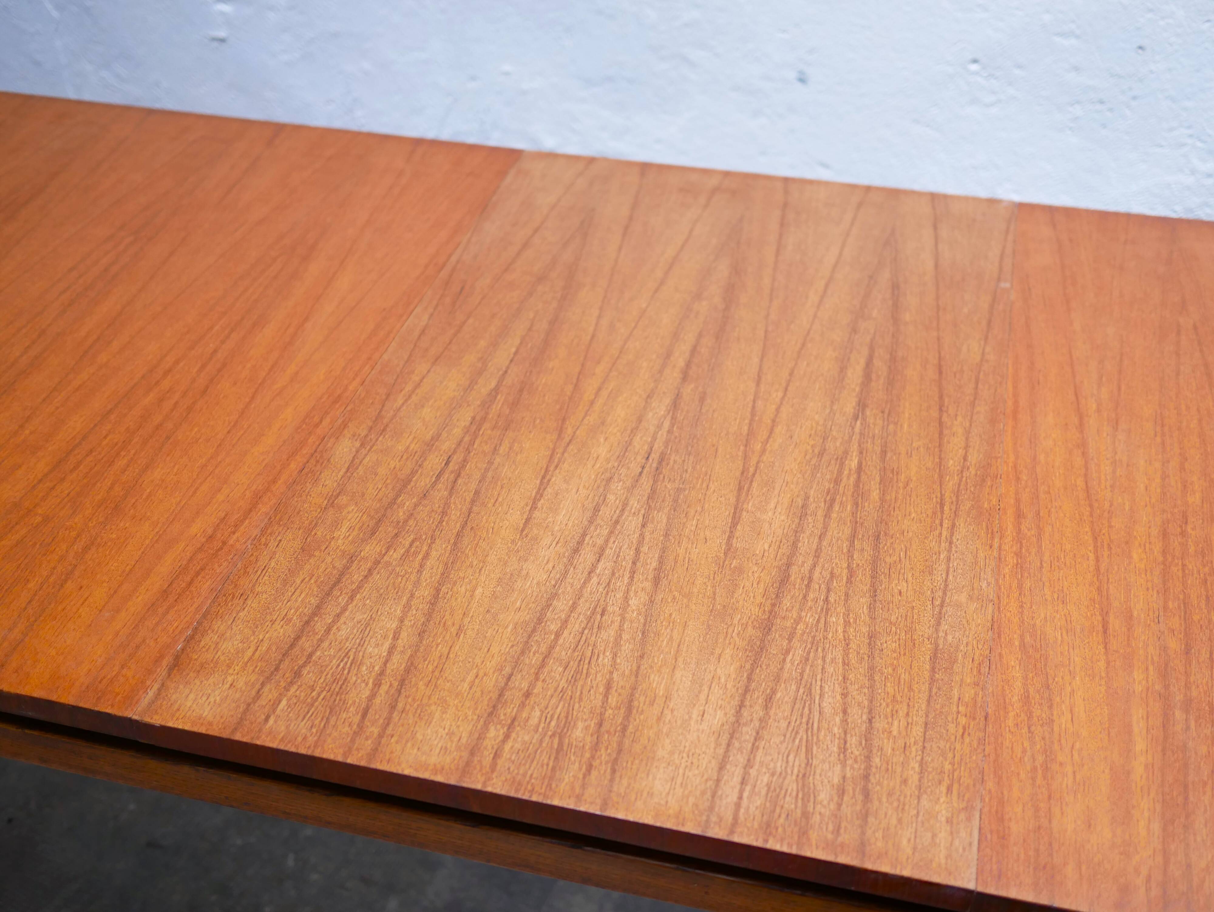 Extendable teak dining table by Gérard Guermonprez for Magnani editions