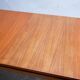 Extendable teak dining table by Gérard Guermonprez for Magnani editions