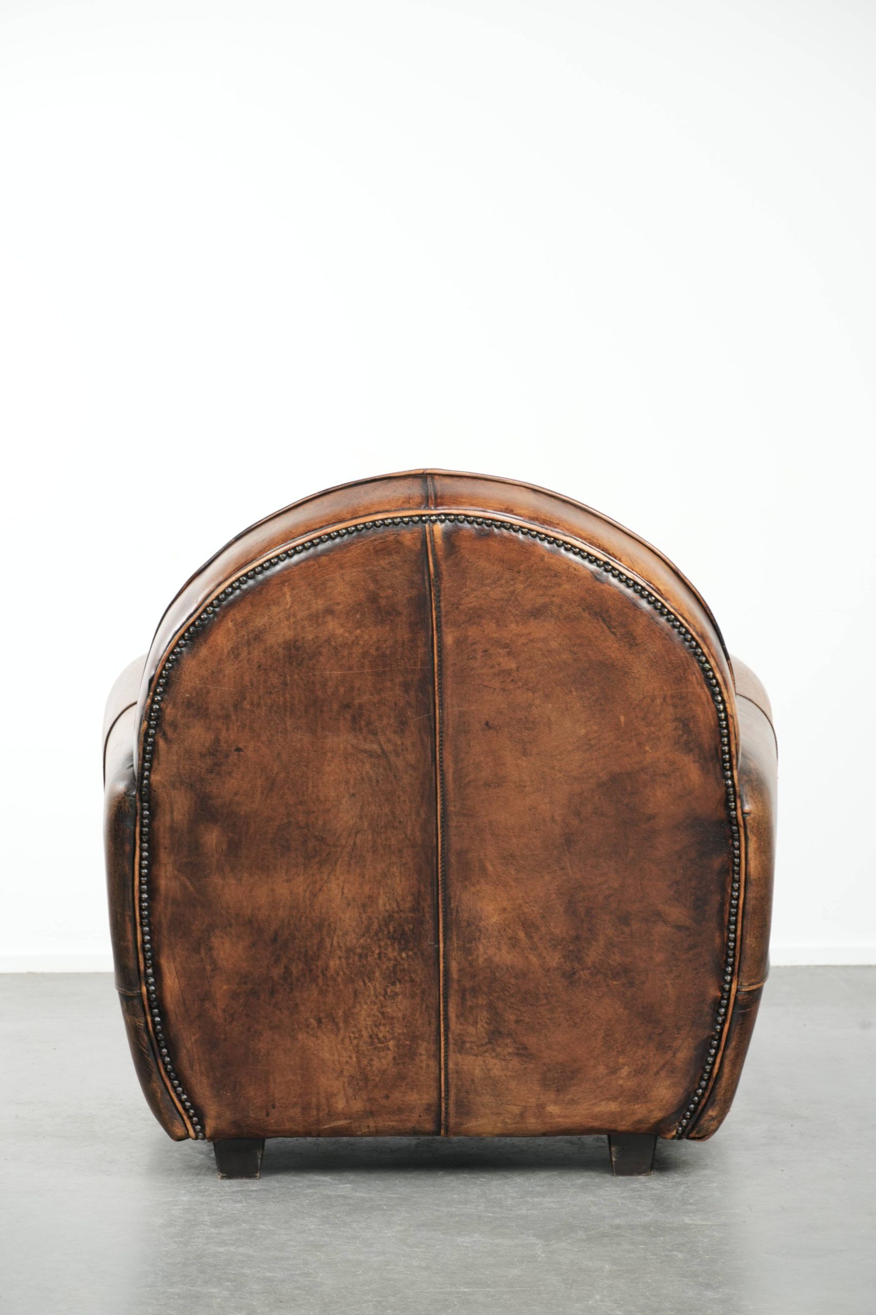Armchair made of sheepskin leather in Art Deco design with beautiful patina