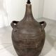 Large amphora floor lamp in pottery with a rattan shade from the 1960s.
