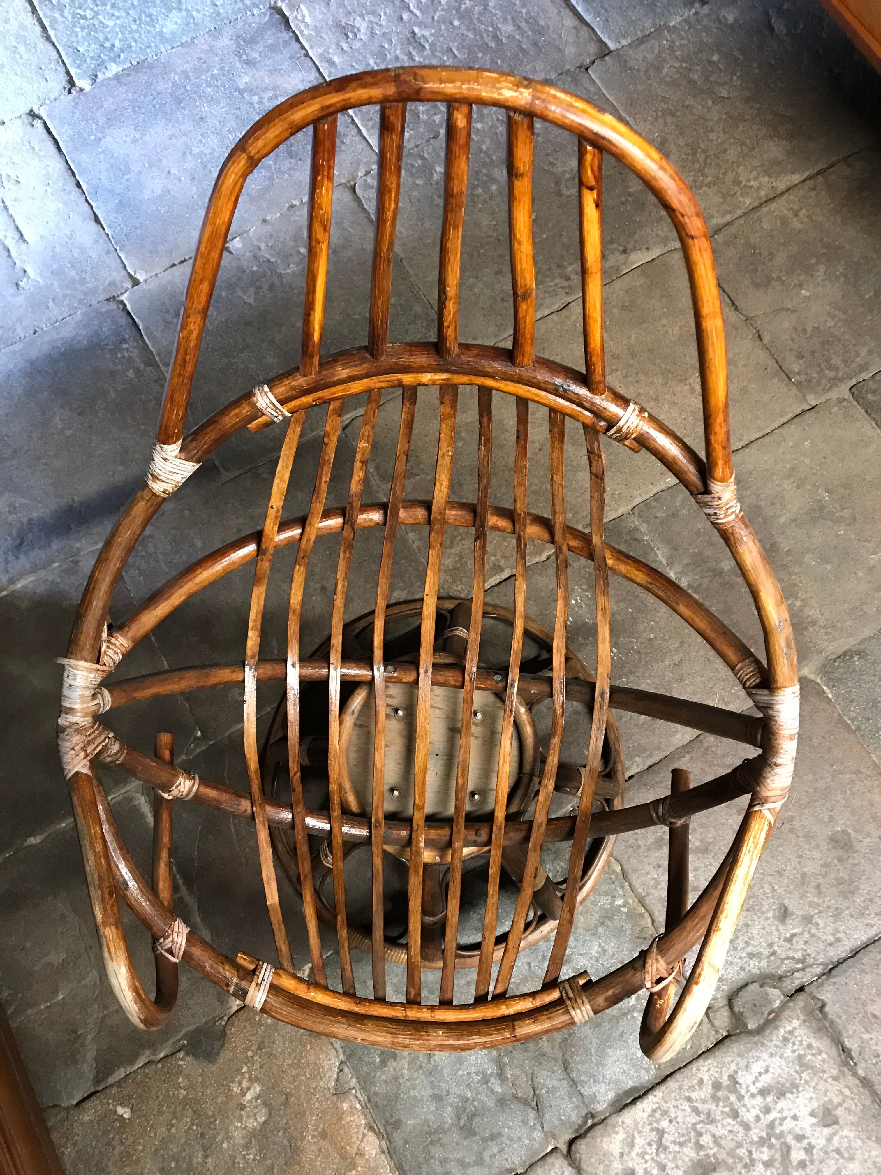 Swivel rattan armchair