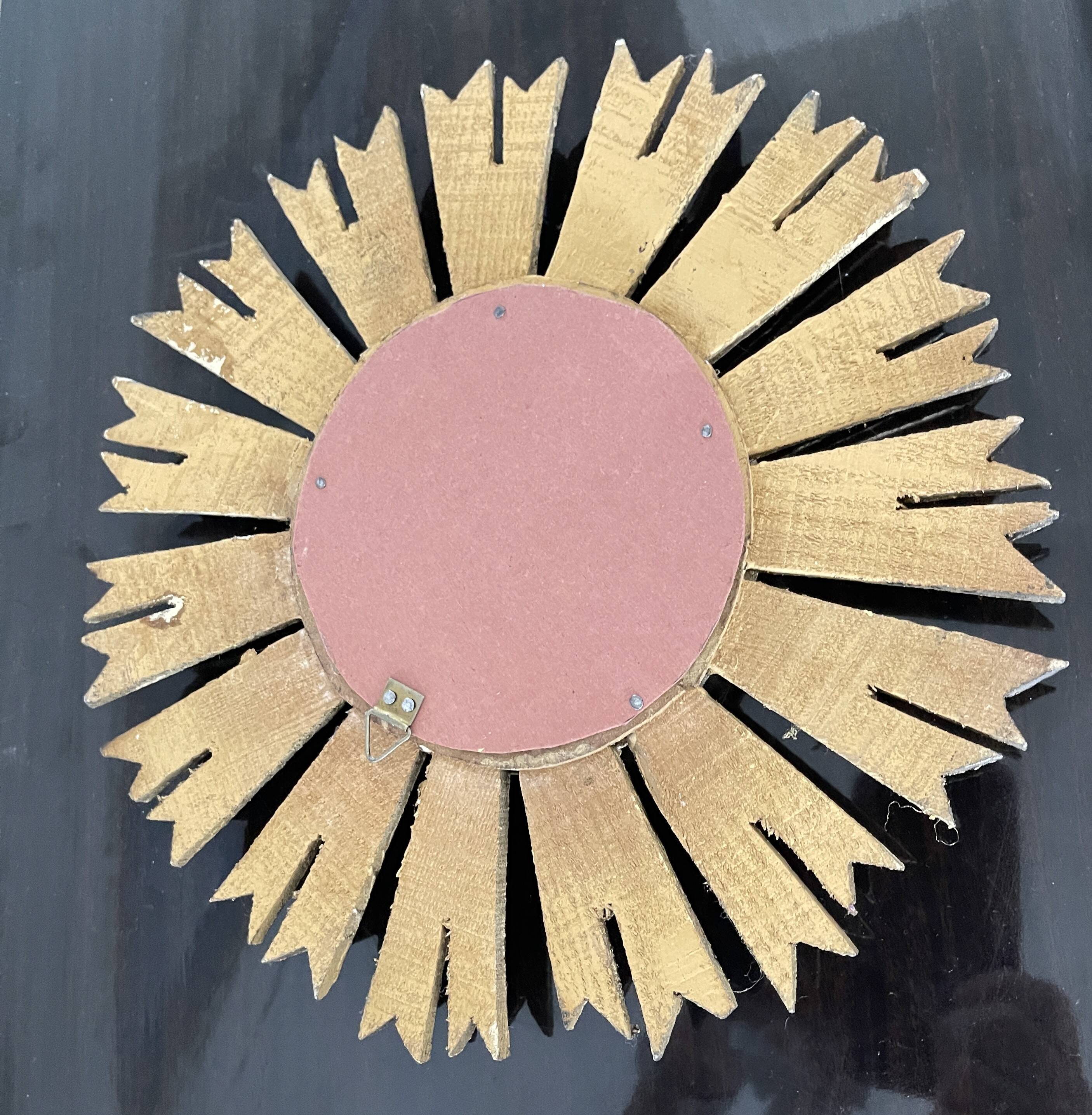 Miroir soleil en bois doré « œil de sorcière »