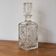Antique cut glass carafe, probably crystal – Geometric patterns and matching stopper.