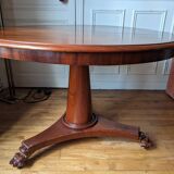 Round mahogany table with extensions