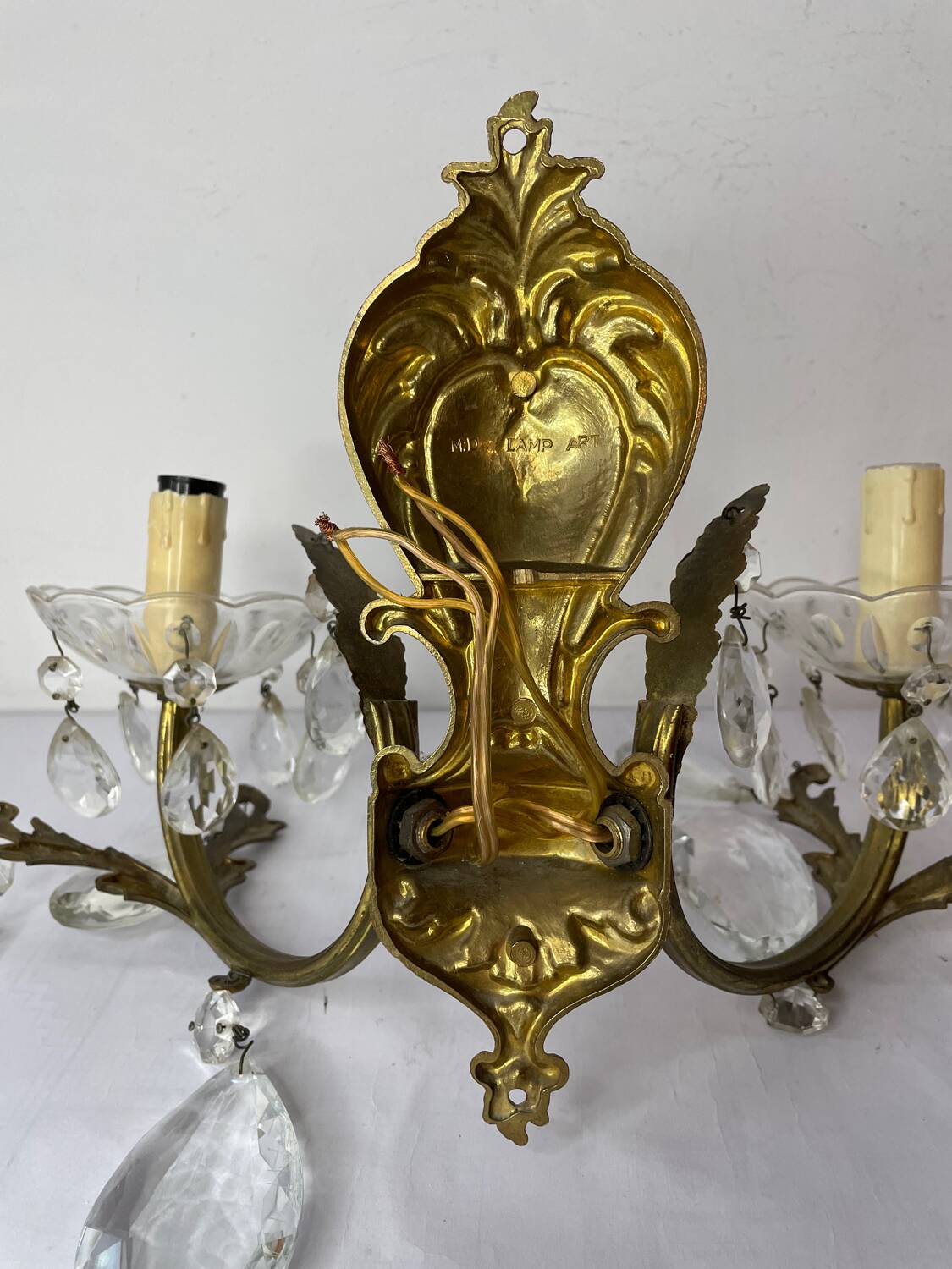 Pair of bronze and crystal wall lights