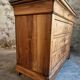 French antique walnut commode with a dark grey marble top, circa 1830–1860.