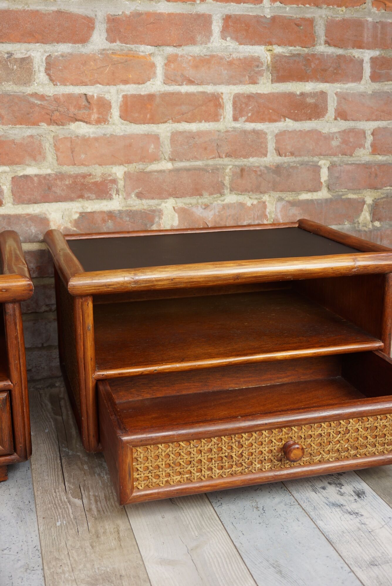 Pair of wooden bedside tables, rattan, canning and faux black leather