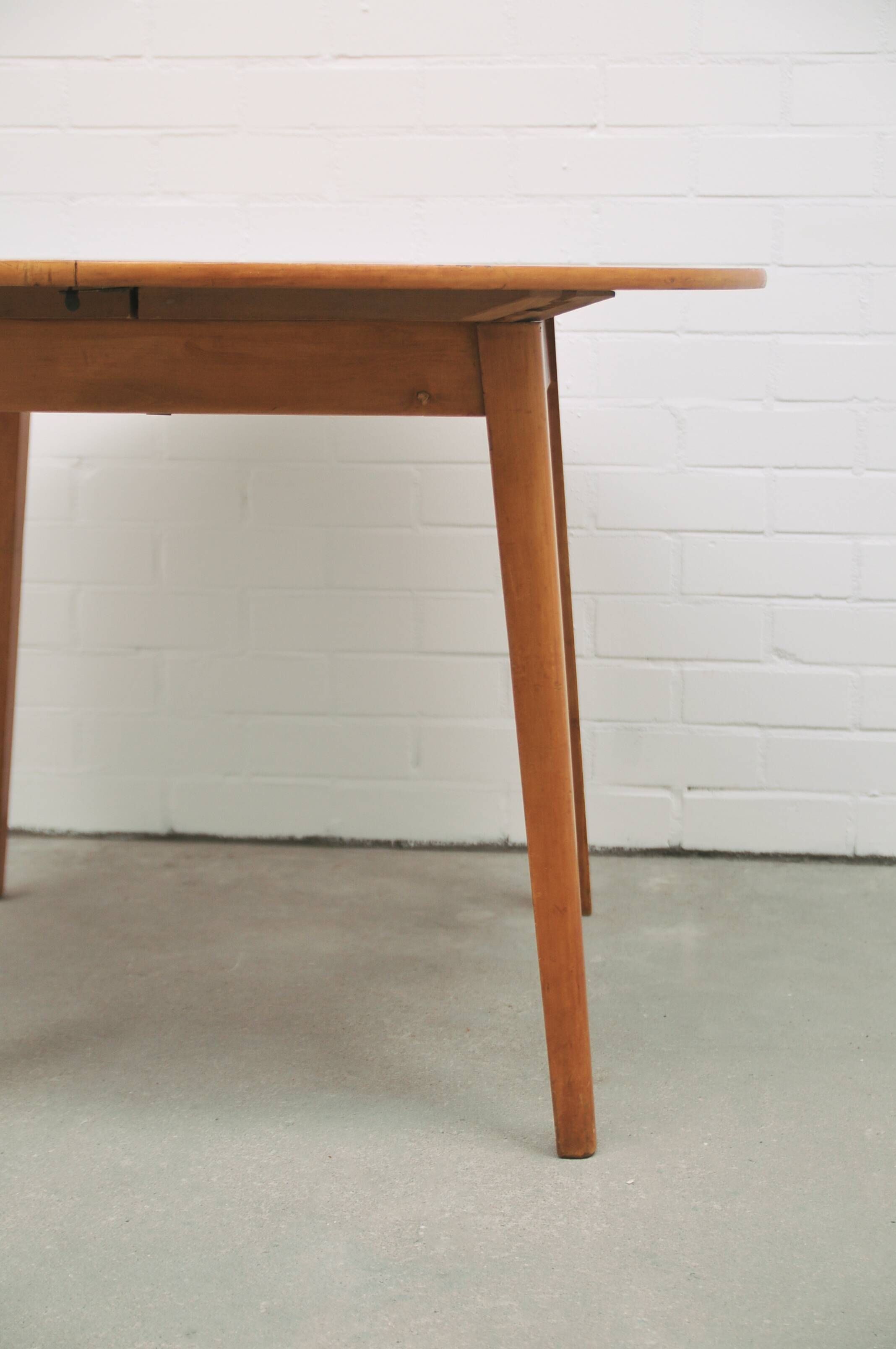 vintage round fold-out dining table