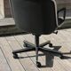 POLLOCK black leather reclining armchair with casters