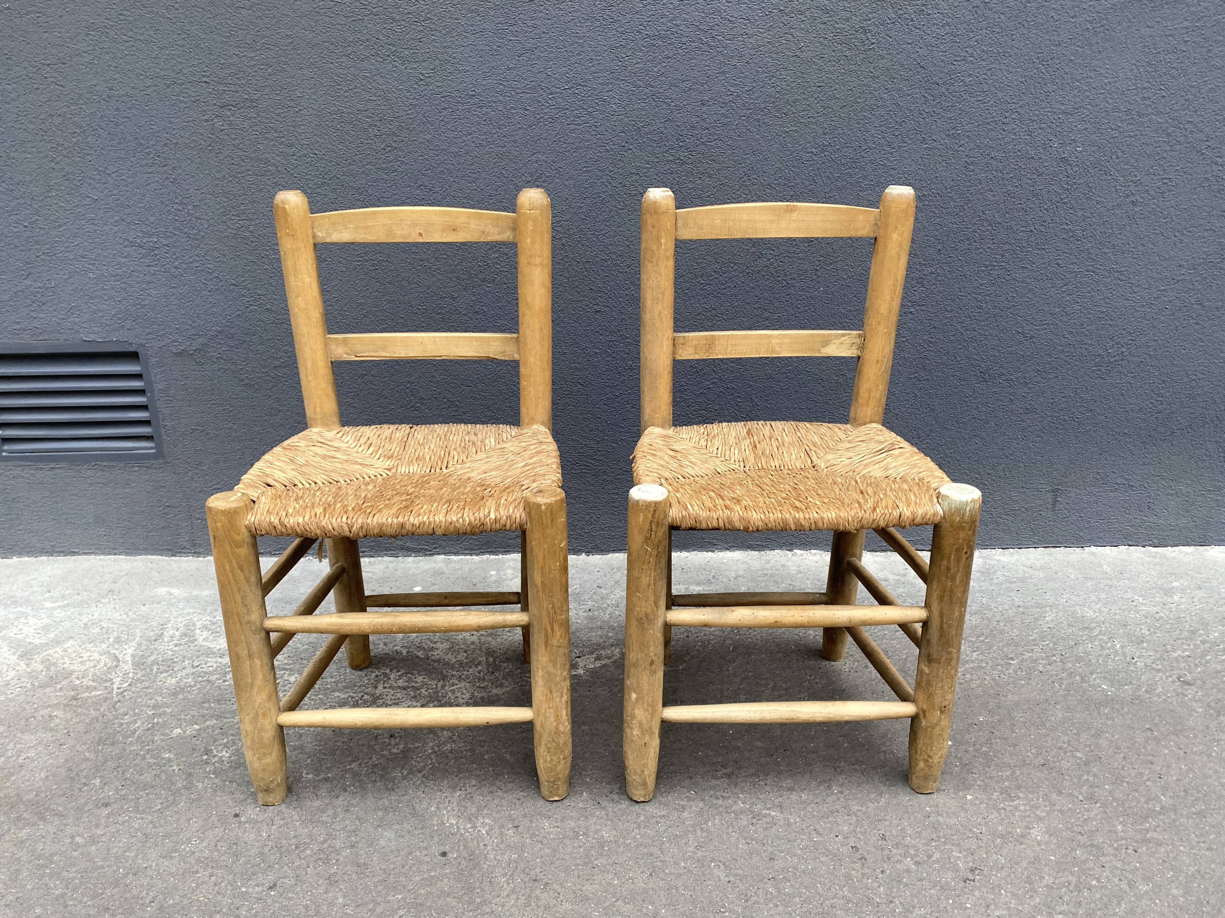Set of 2 chairs in raw wood and straw from the 50s