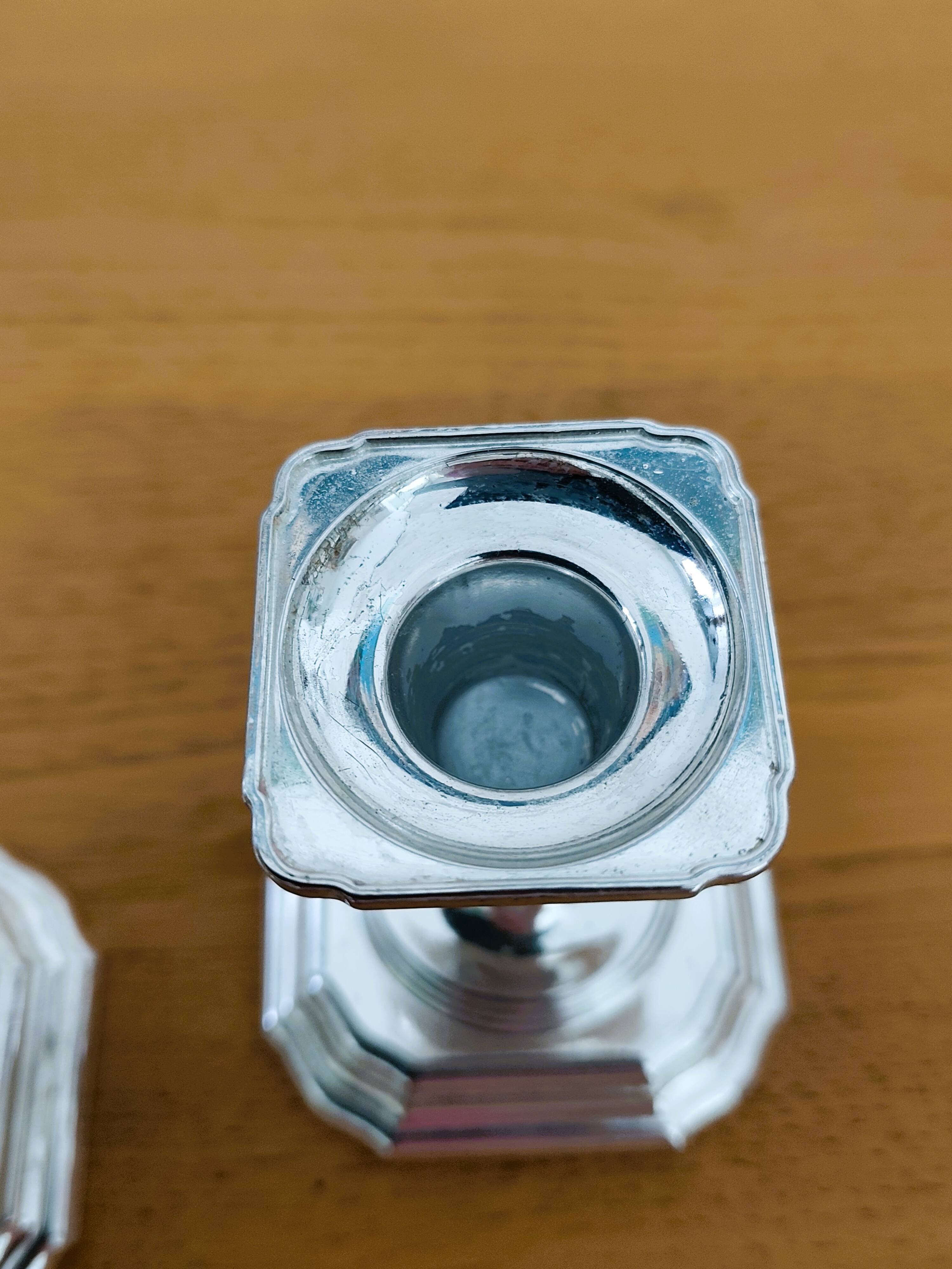 Pair of antique silver-plated candlesticks