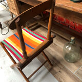 Old vintage camping chair wood and canvas