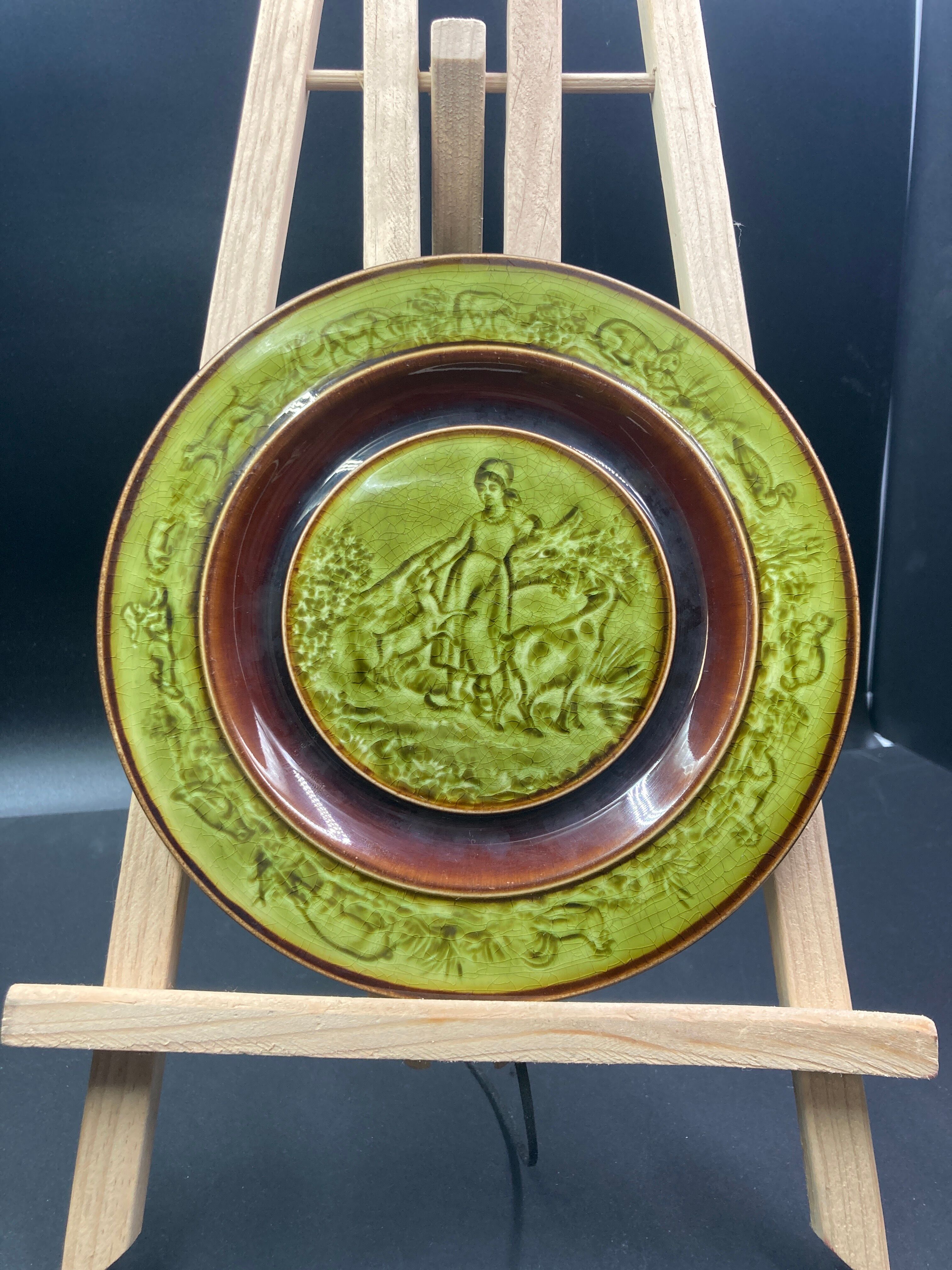 Two faience plates enamelled with choisy le roi HB & cie