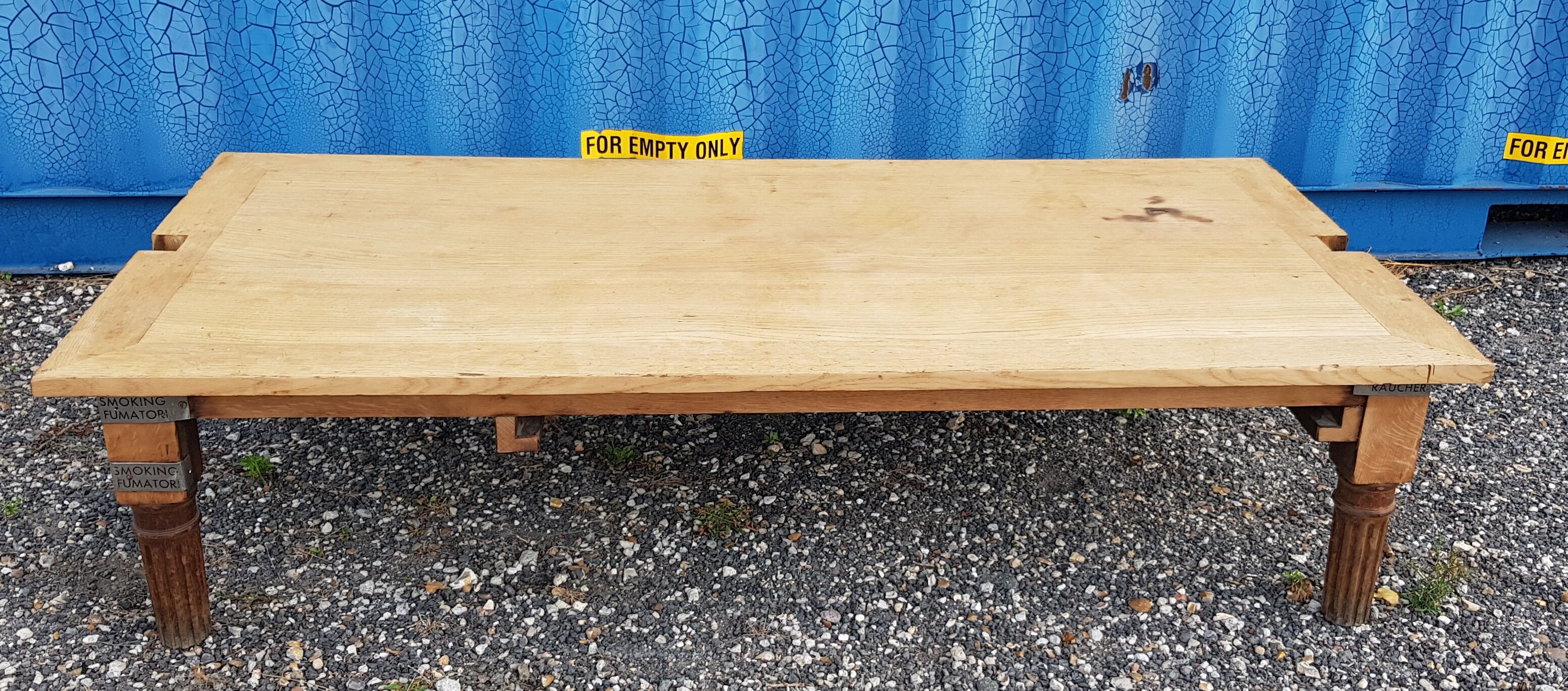 Solid oak coffee table from a pool academy