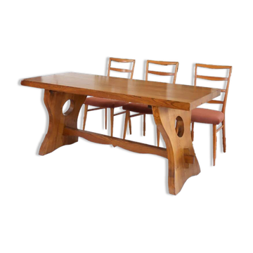 Solid wood dining table, sculpted brutalist base, 1960s.