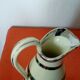 Old earthenware jug from Langeais with a spout.