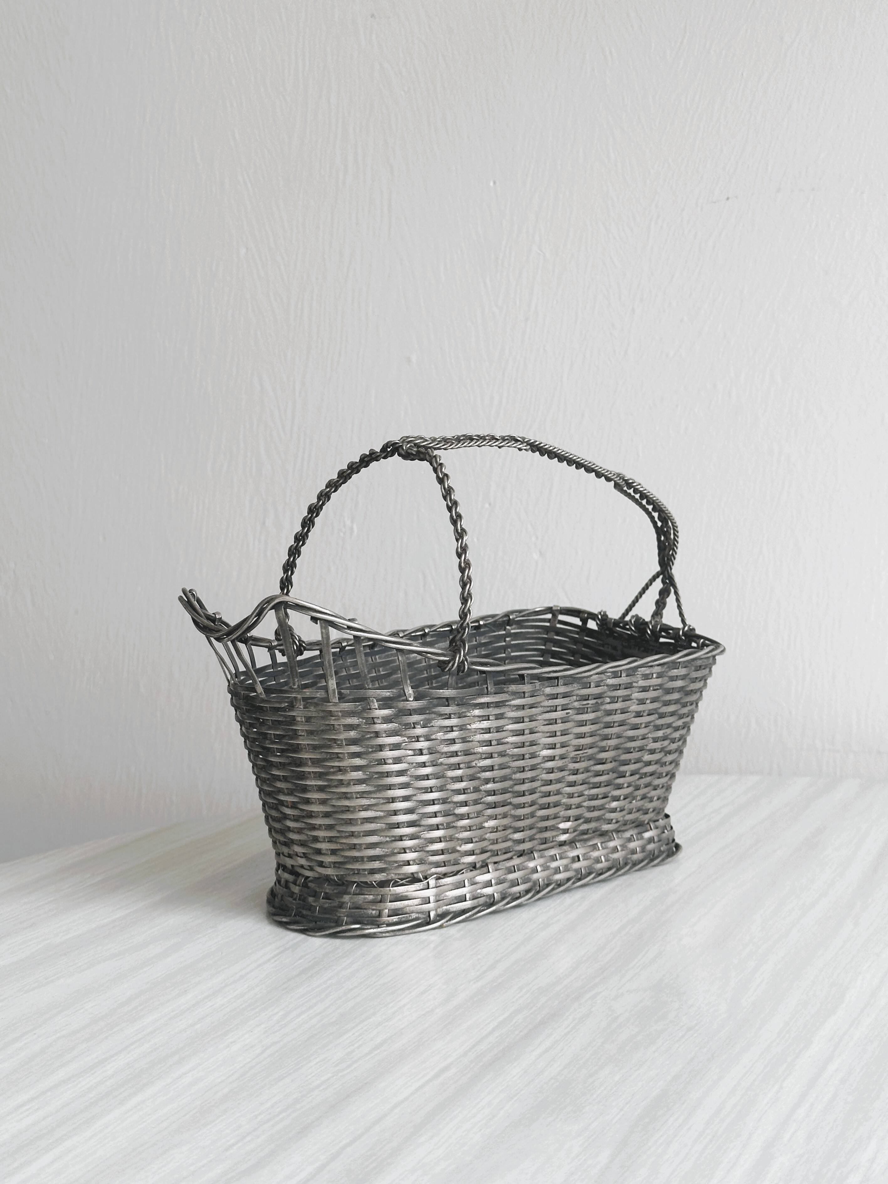 Woven metal wine basket