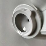 Vintage coffee pot Winterling Bavaria with orange floral decoration.