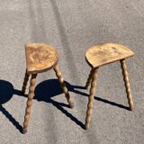 Pair of tripod farm stools in turned wood