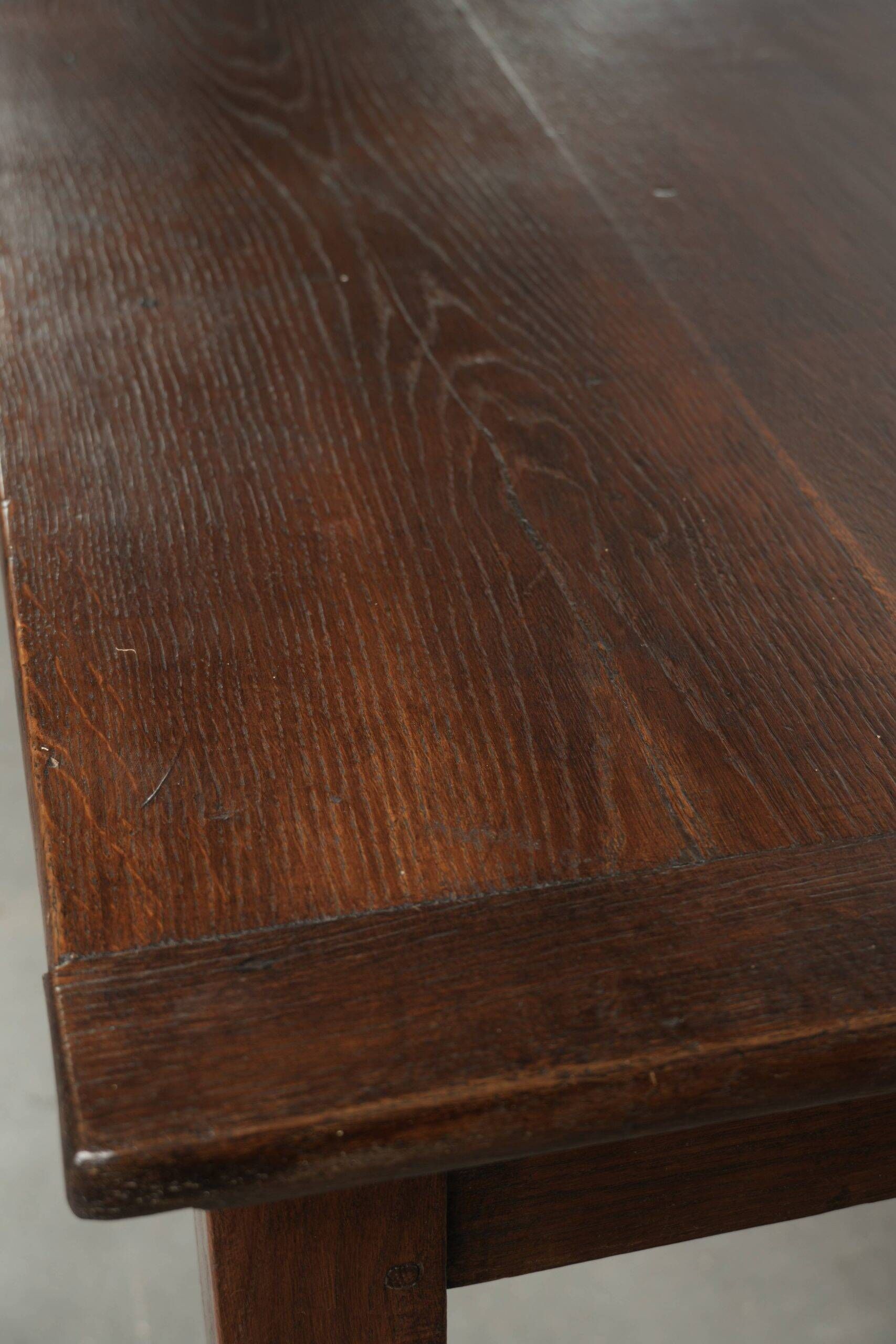 Antique French oak dining table from the early 19th century