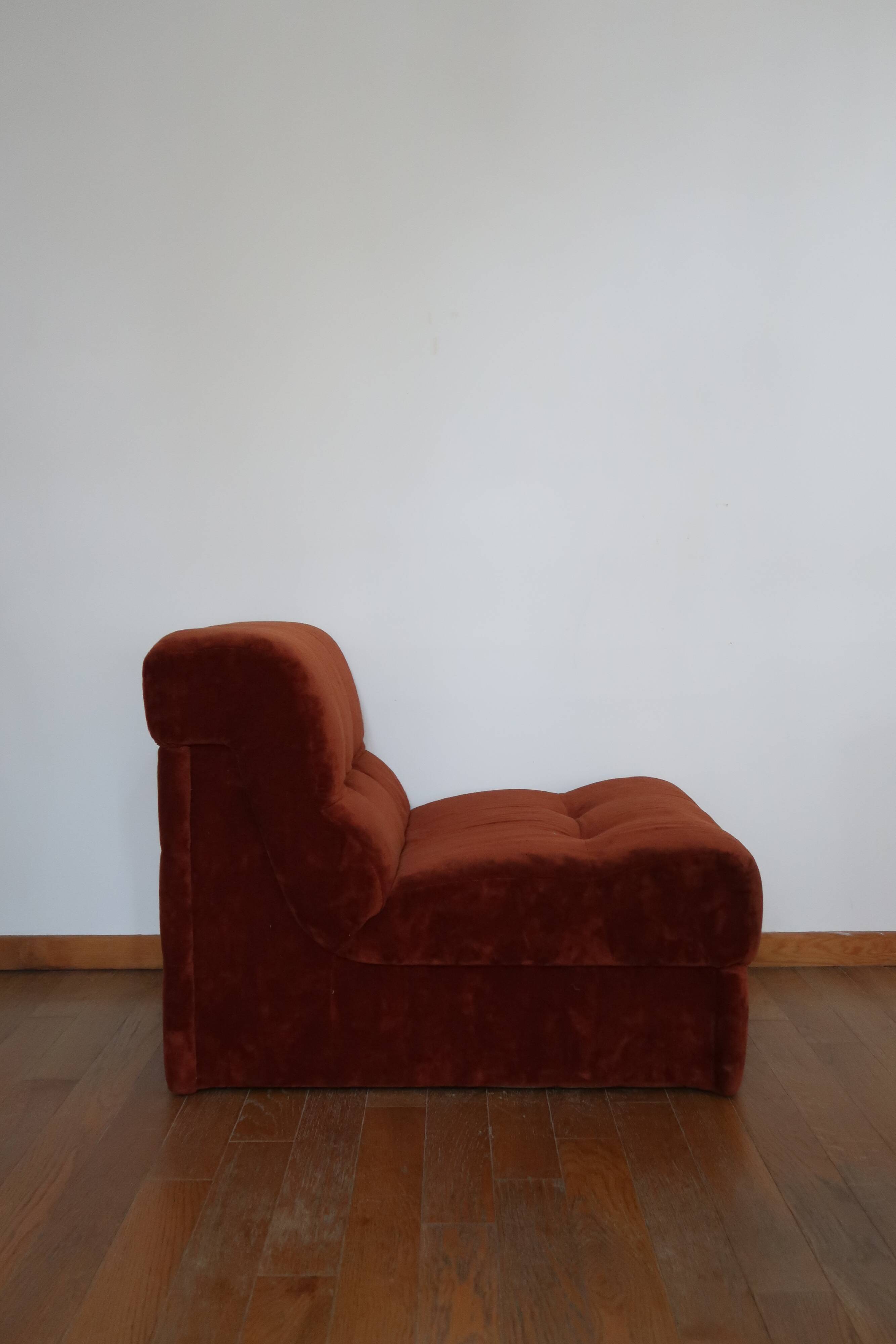 Rusty velvet low chair without arms