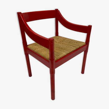 Carimate model 892 Vico Magistretti for Cassina in red armchair