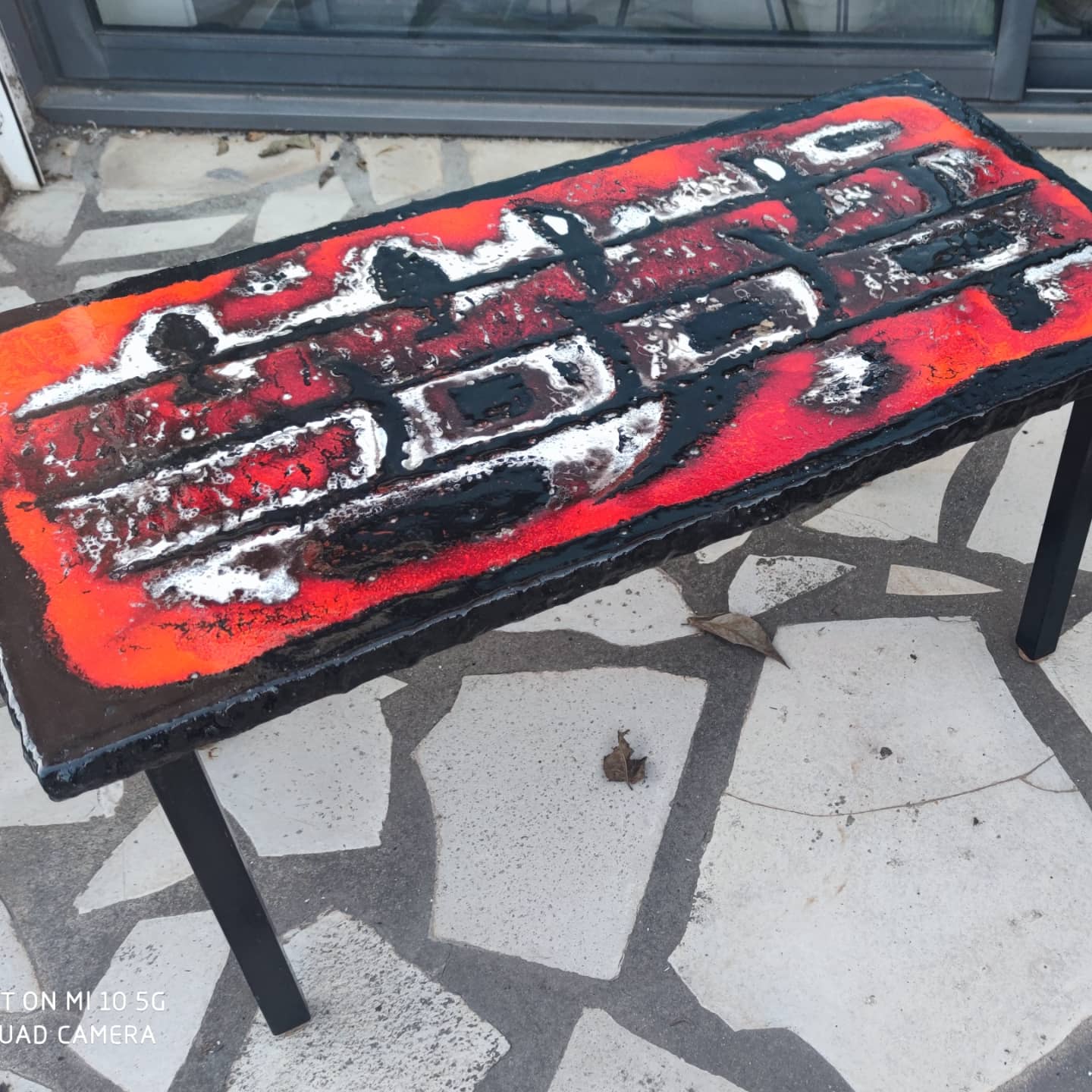 Ceramic coffee table on a lava stone slab, circa 1950