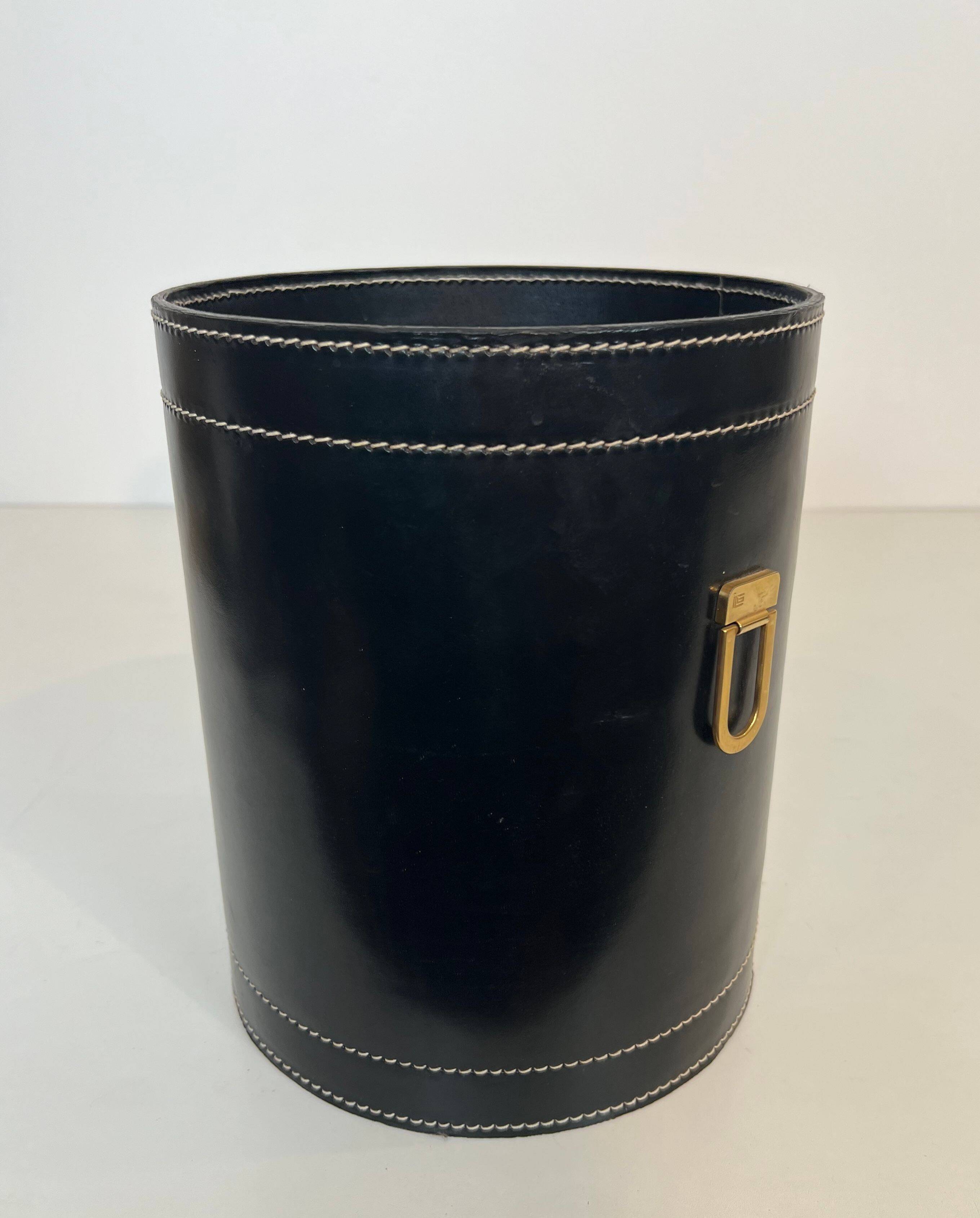 Black leather and brass desk basket