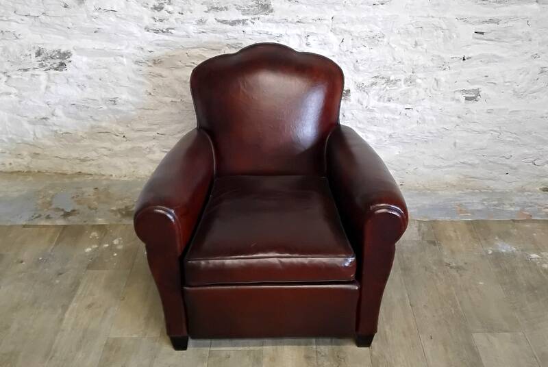 Club chair with floral backrest