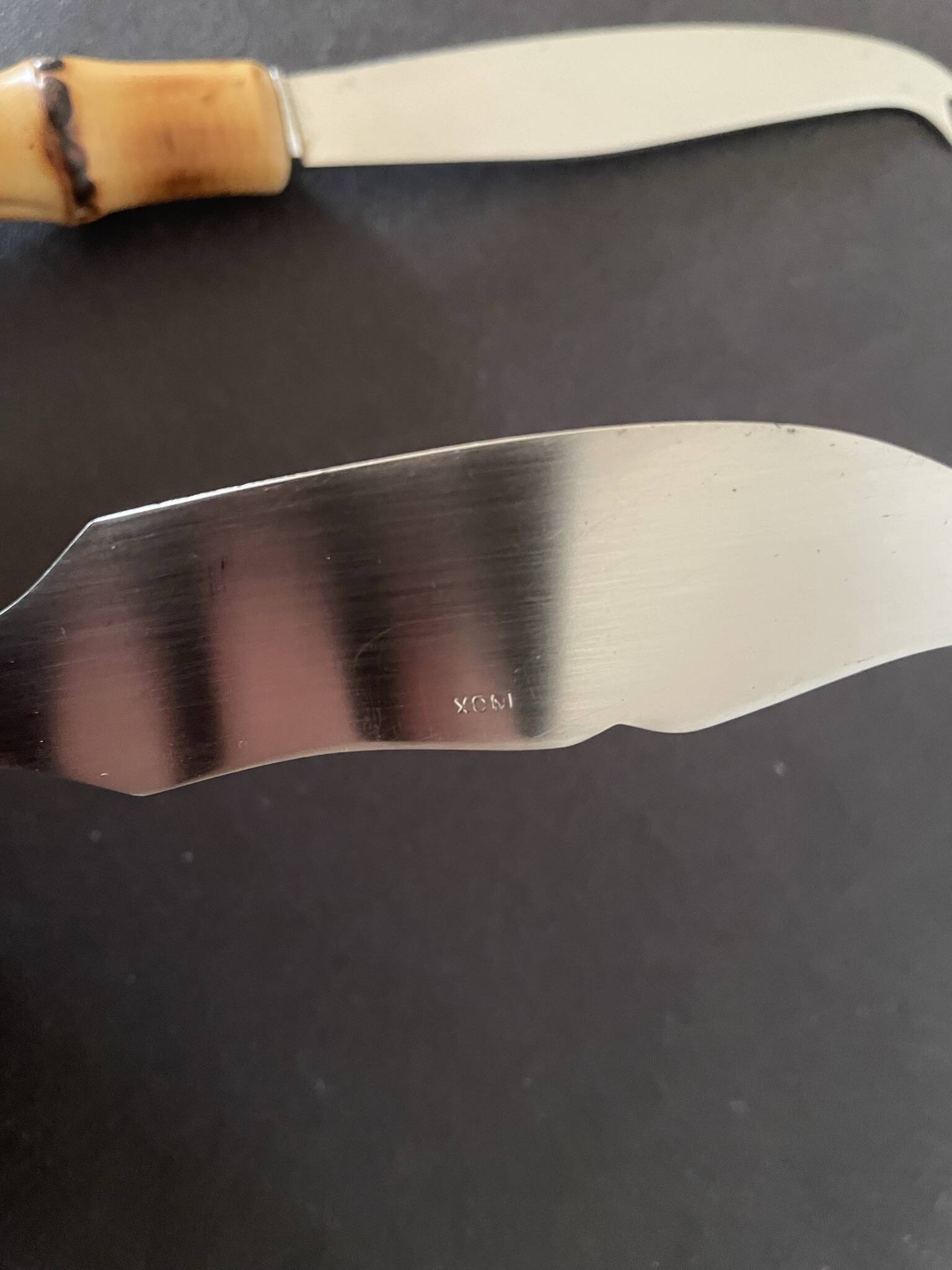 Bamboo handle cheese knives.