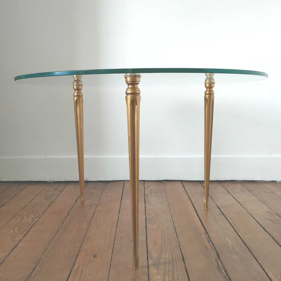 Tripod golden round coffee table