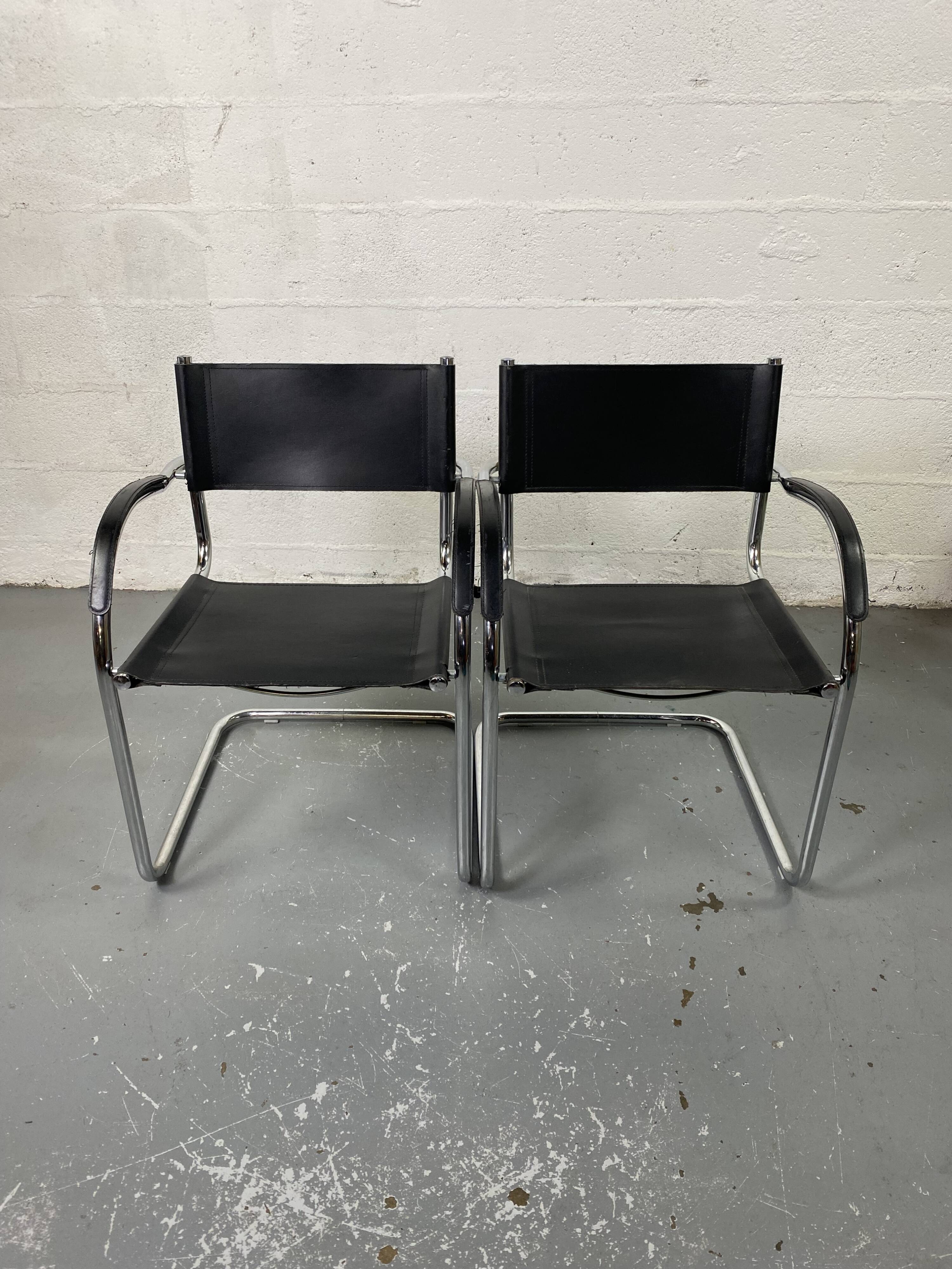 Pair of design armchairs in imitation leather chrome