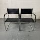 Pair of design armchairs in imitation leather chrome