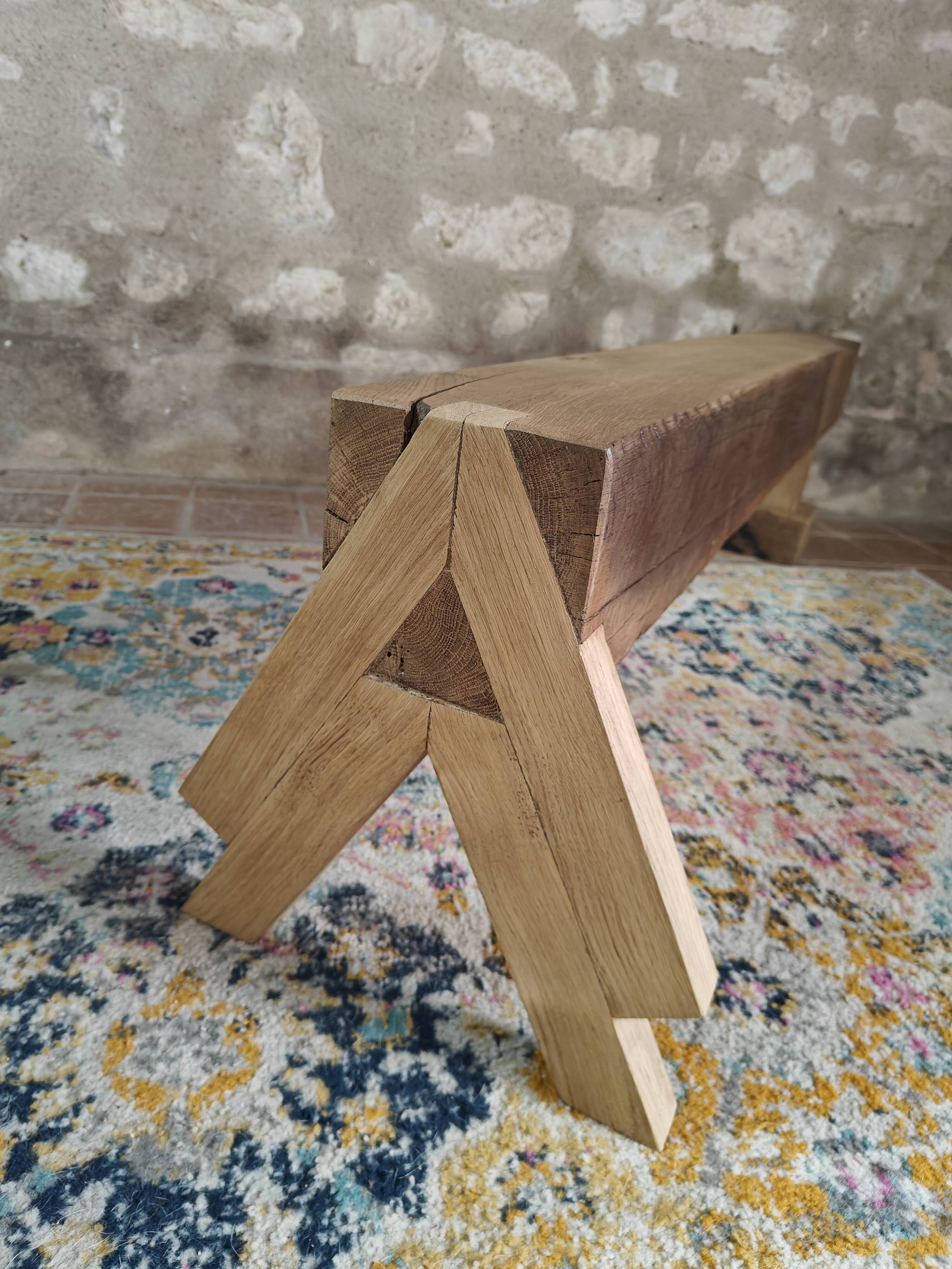 Solid oak bench with asymmetrical legs