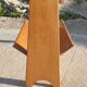 Magazine rack with sliding drawers in light wood, Scandinavian style.