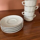 Four porcelain "bistro" cups and saucers
