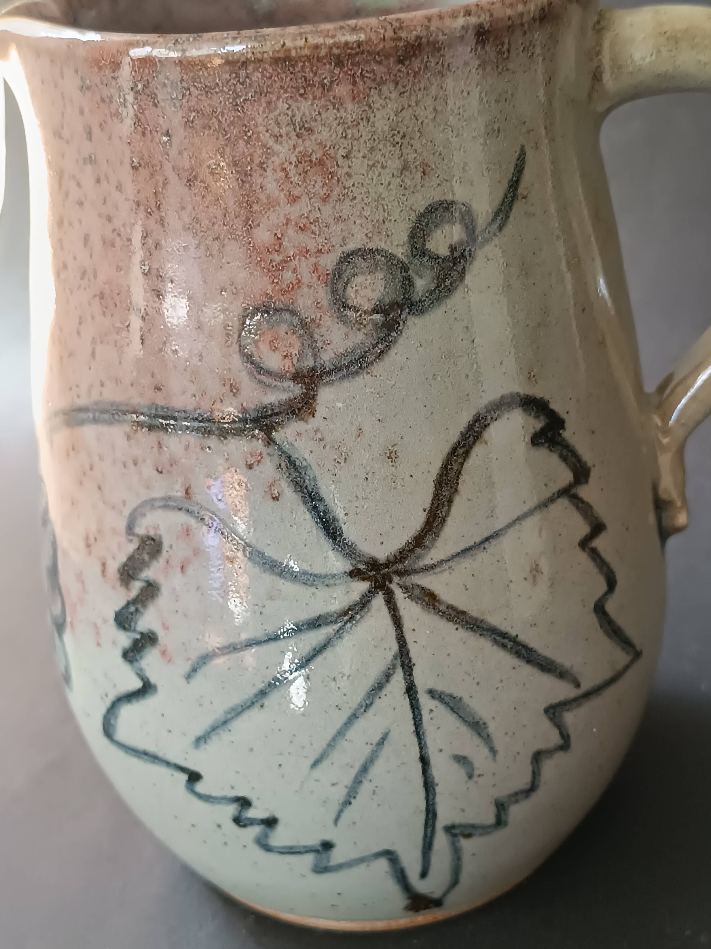 Stoneware pitcher from Alsace, incised decoration of vine by Louis Buecher 1986.
