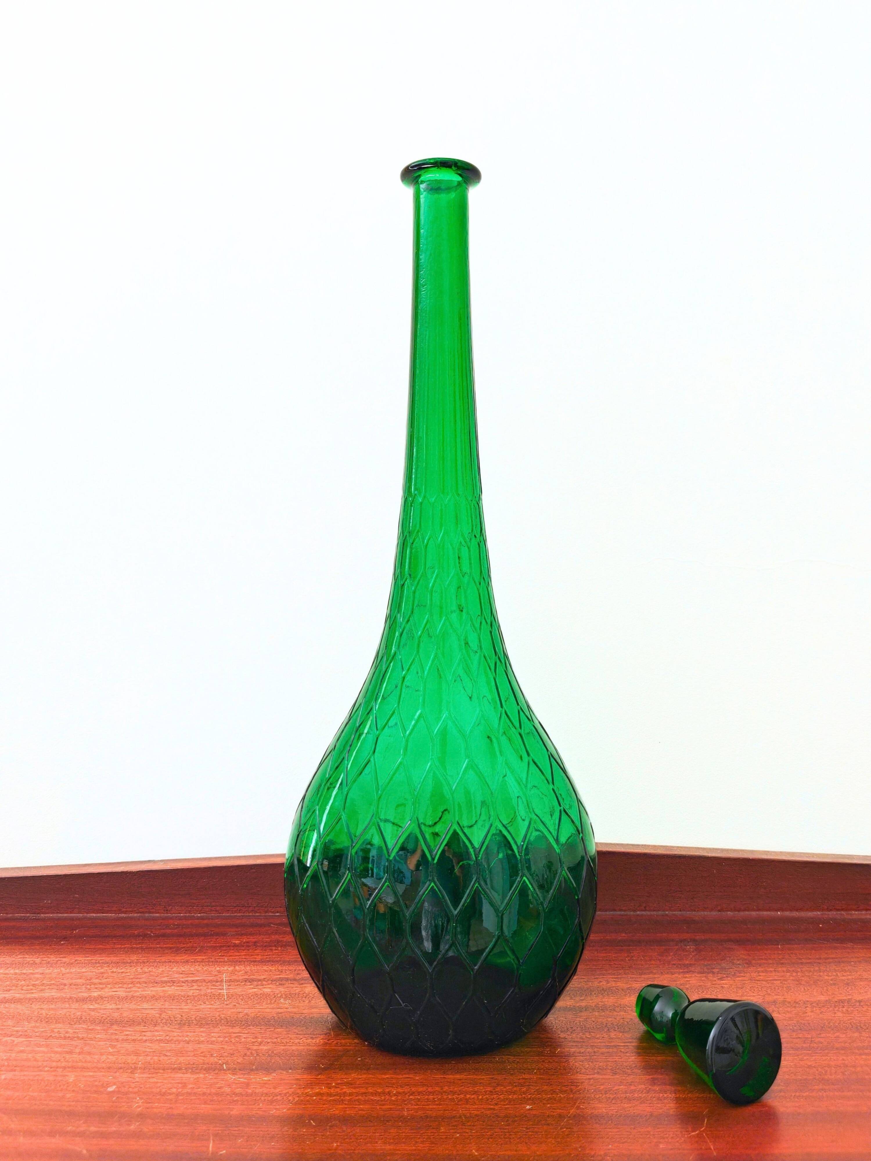 Italian carafe Empoli in iridescent green with diamond pattern.